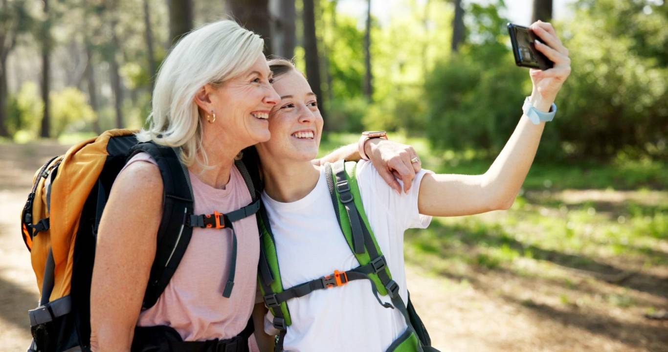 mother and daughter with photography for social media fitness experience and wellness (medium)