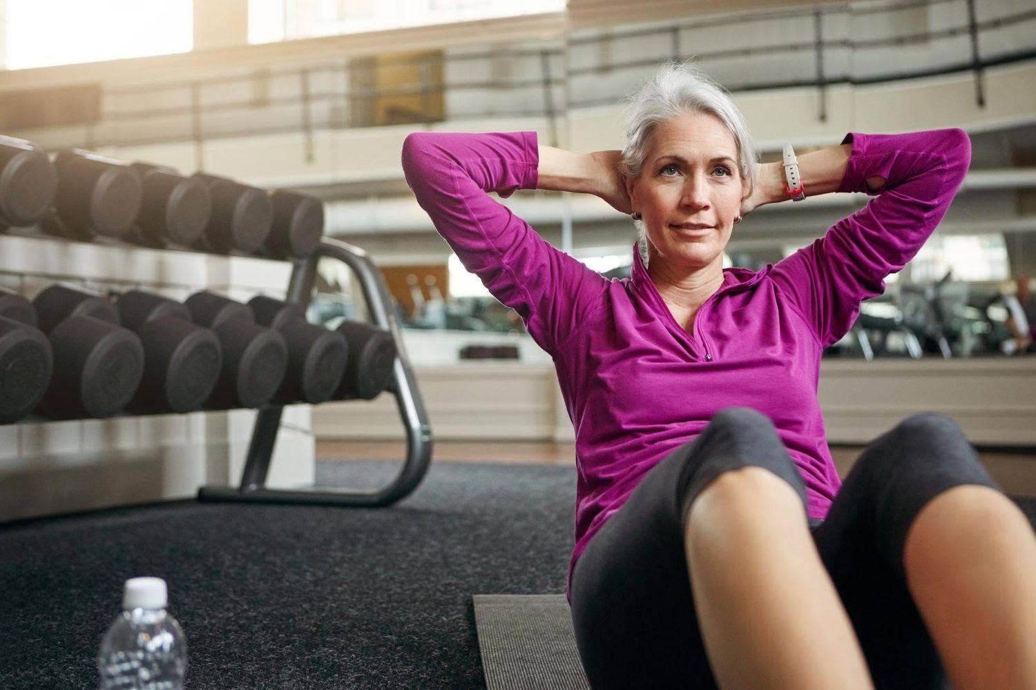 woman gym and stomach exercise