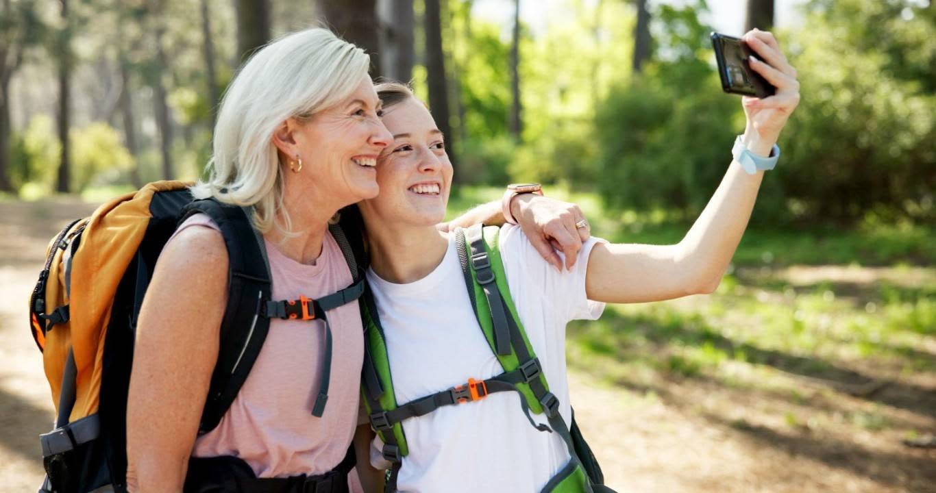mother and daughter with photography for social media fitness experience and wellness (medium)